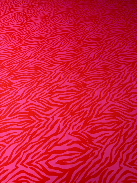 Red and Pink Patterned Tiger Striped Fabric Sold by Metre