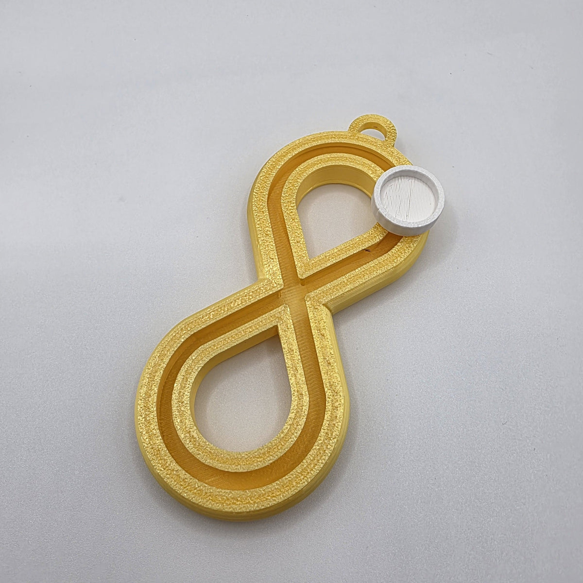 3dFidgets - Infinite Breath a soothing, figure-eight fidget tool designed to help you slow down, regulate your breathing, and find calm anytime, anywhere