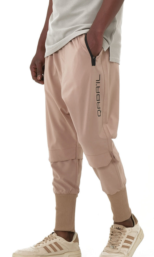 QL Pantalon Cross Over in Taupe