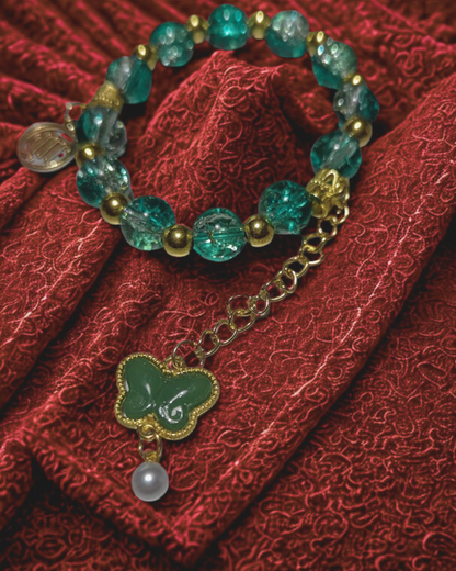 Teal Crackle Glass Butterfly Charm Bracelet with Virgo Charm & Pearl Drop (Gold-Tone)