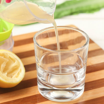 Multi-function Manual Mini Lemon Juicer with a Graduation Cup Juicer