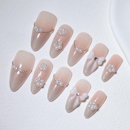 10-Piece Nude Gradient Cat’s Eye Press-On Nails with Pearl Bow & Rhinestones – Almond Shape (XS)