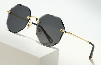 Polygonal Rimless Trimmed Sunglasses