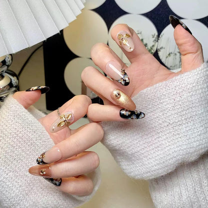 CTTHNBD Medium Almond Press-On Nails with Flower Design – Black & Gold Glossy (Size L)