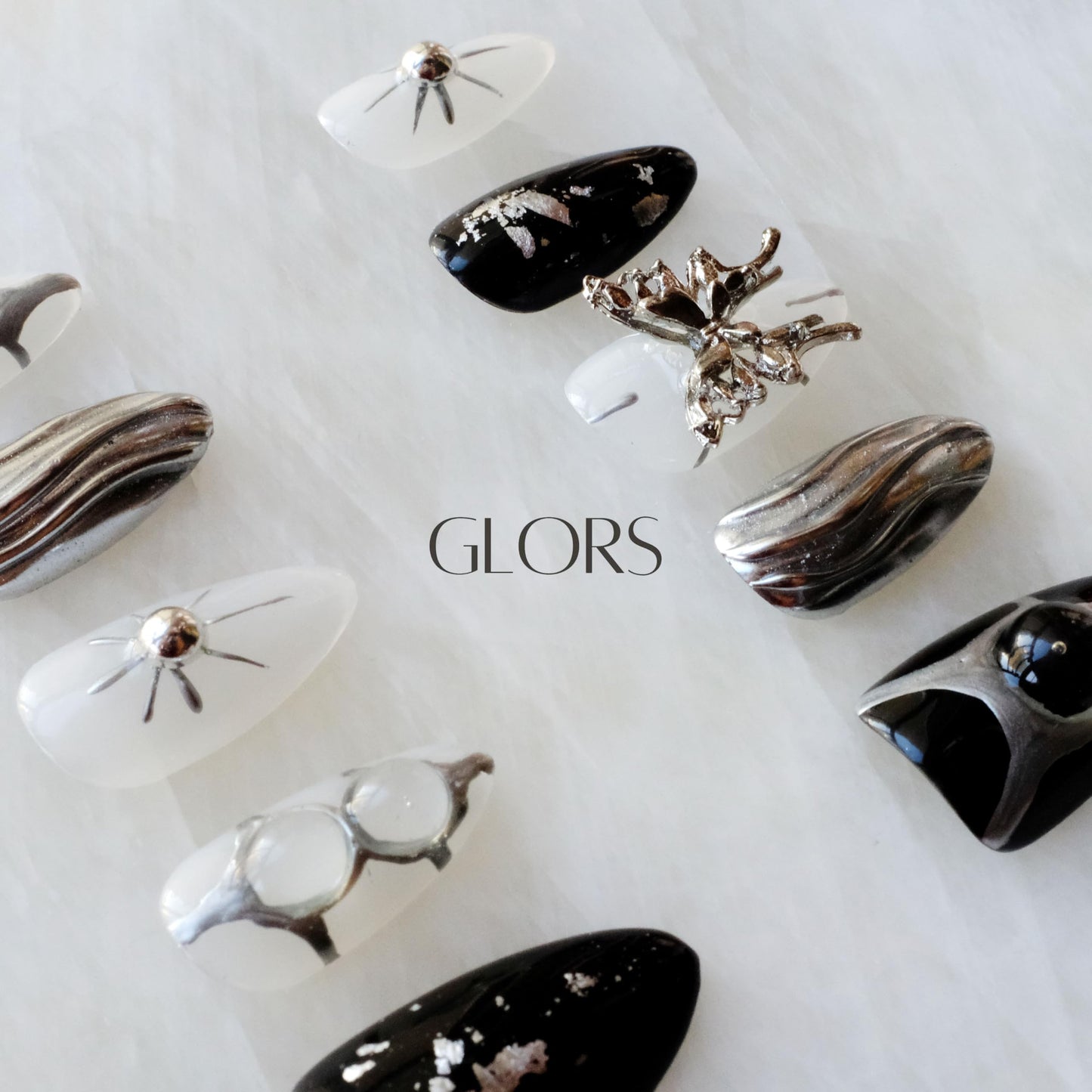 GLORS Gothic Long Almond Press-On Nails – Black & Silver with Butterfly Accent (10 Pieces)
