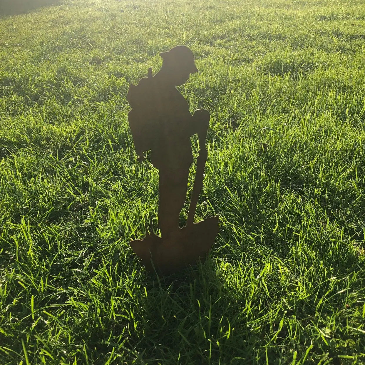 Small Rusty Metal Lest We Forget Soldier Statue