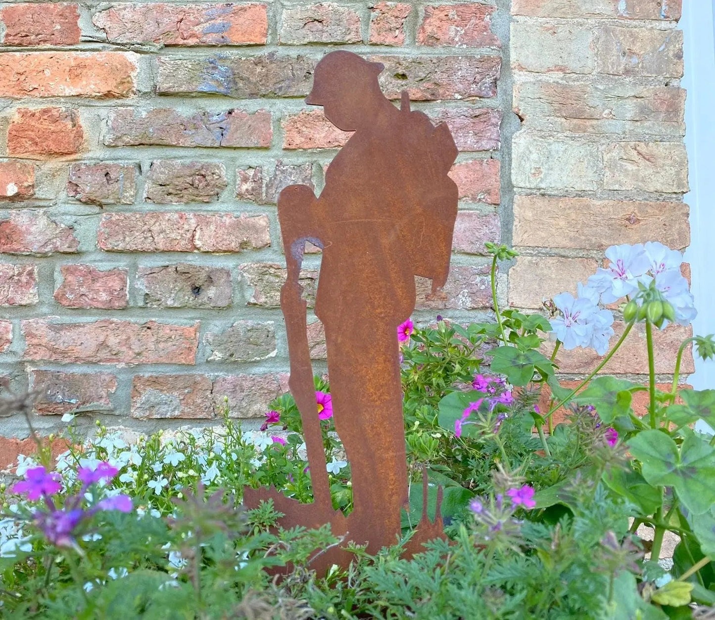 Small Rusty Metal Lest We Forget Soldier Statue