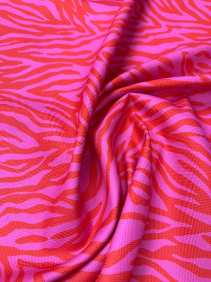 Red and Pink Patterned Tiger Striped Fabric Sold by Metre