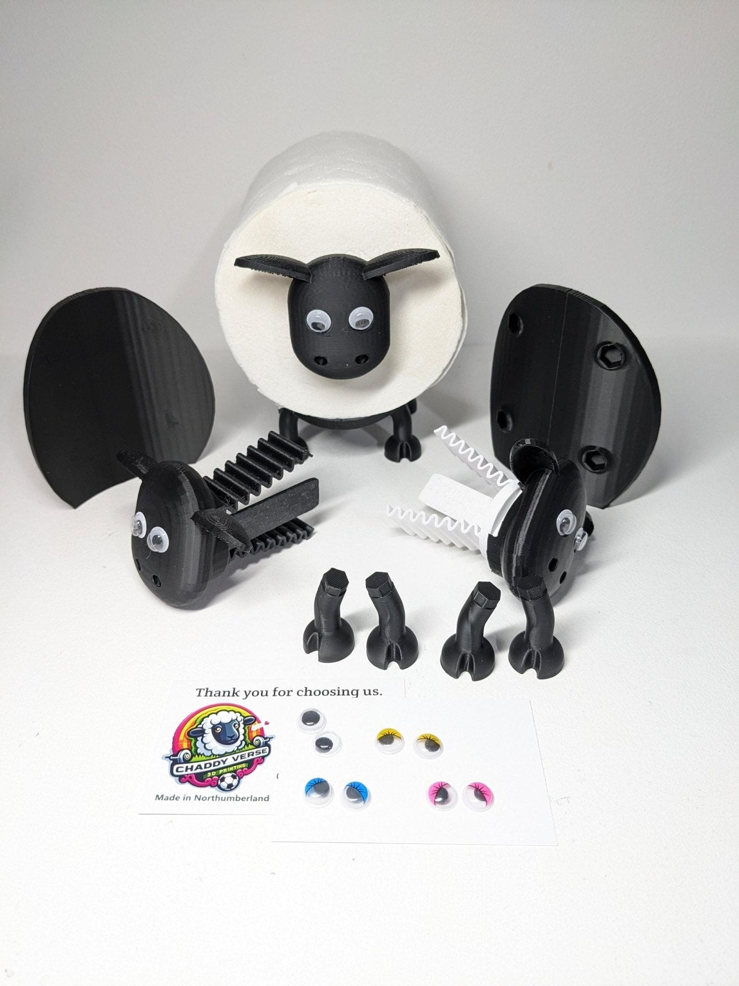 Universal fitting black sheep spare toilet roll holder .