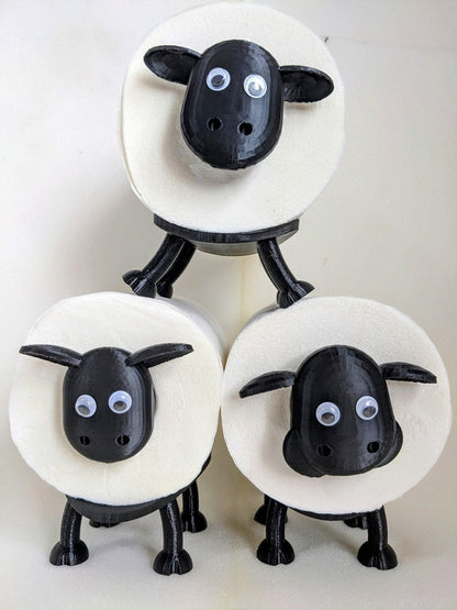 Universal fitting black sheep spare toilet roll holder .
