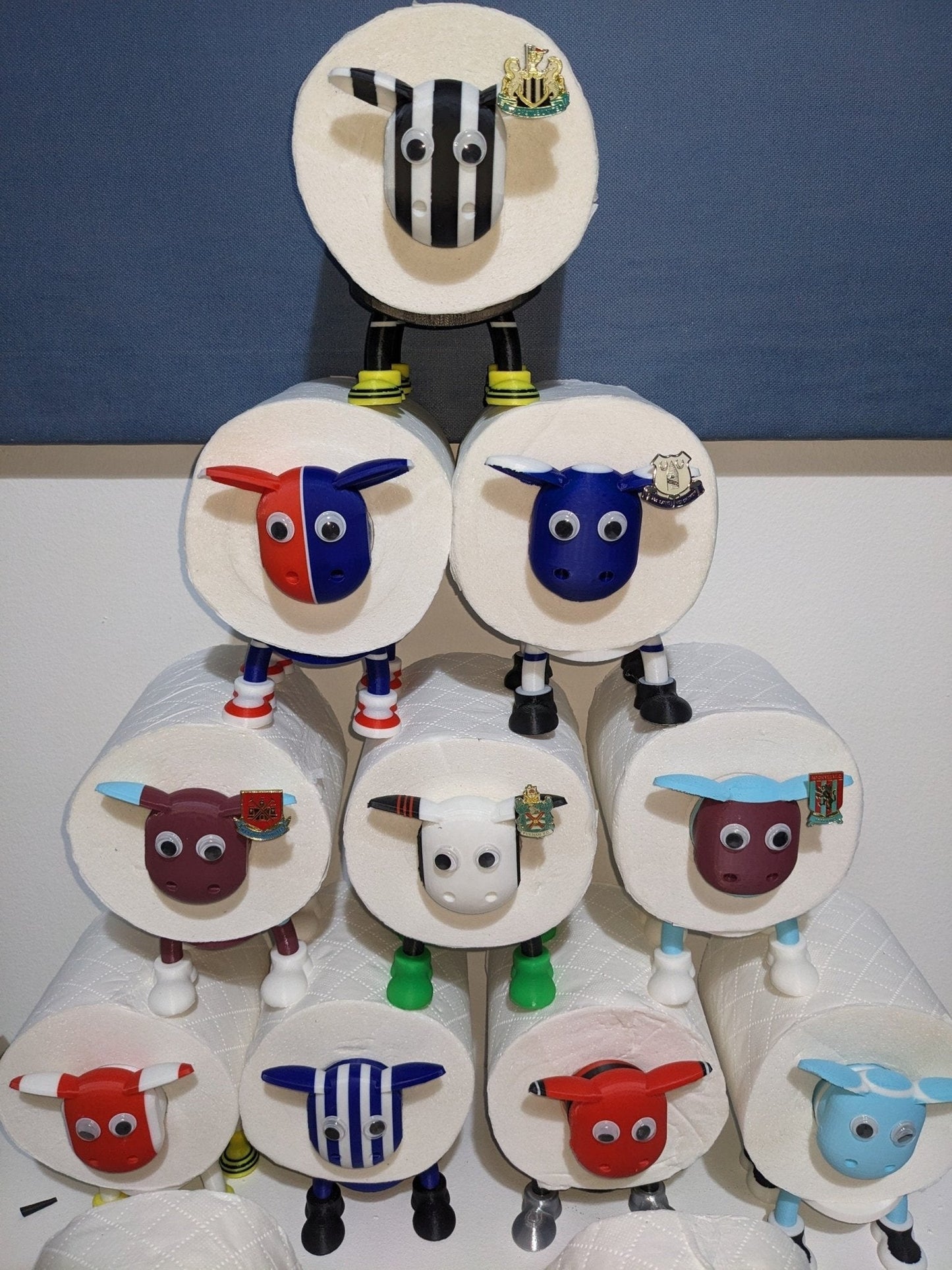 Universal fitting black sheep spare toilet roll holder .