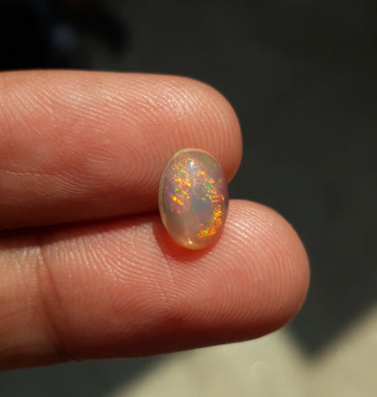 Opal for Sale - White Fire Opal - Welo Opal - October Birthstone - 10x7mm 1.3ct